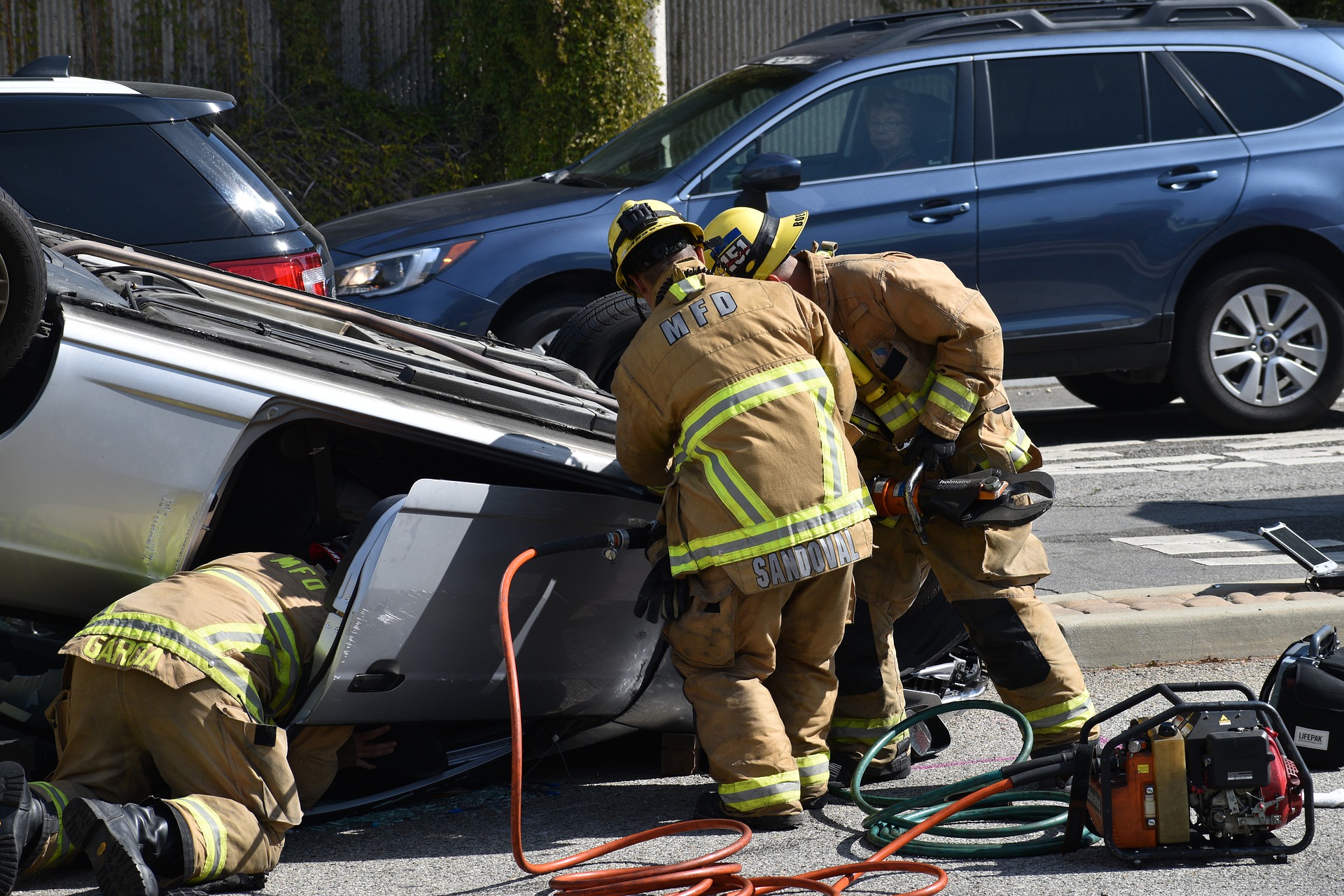 Vehicles placed in unusual positions resembling yoga poses.