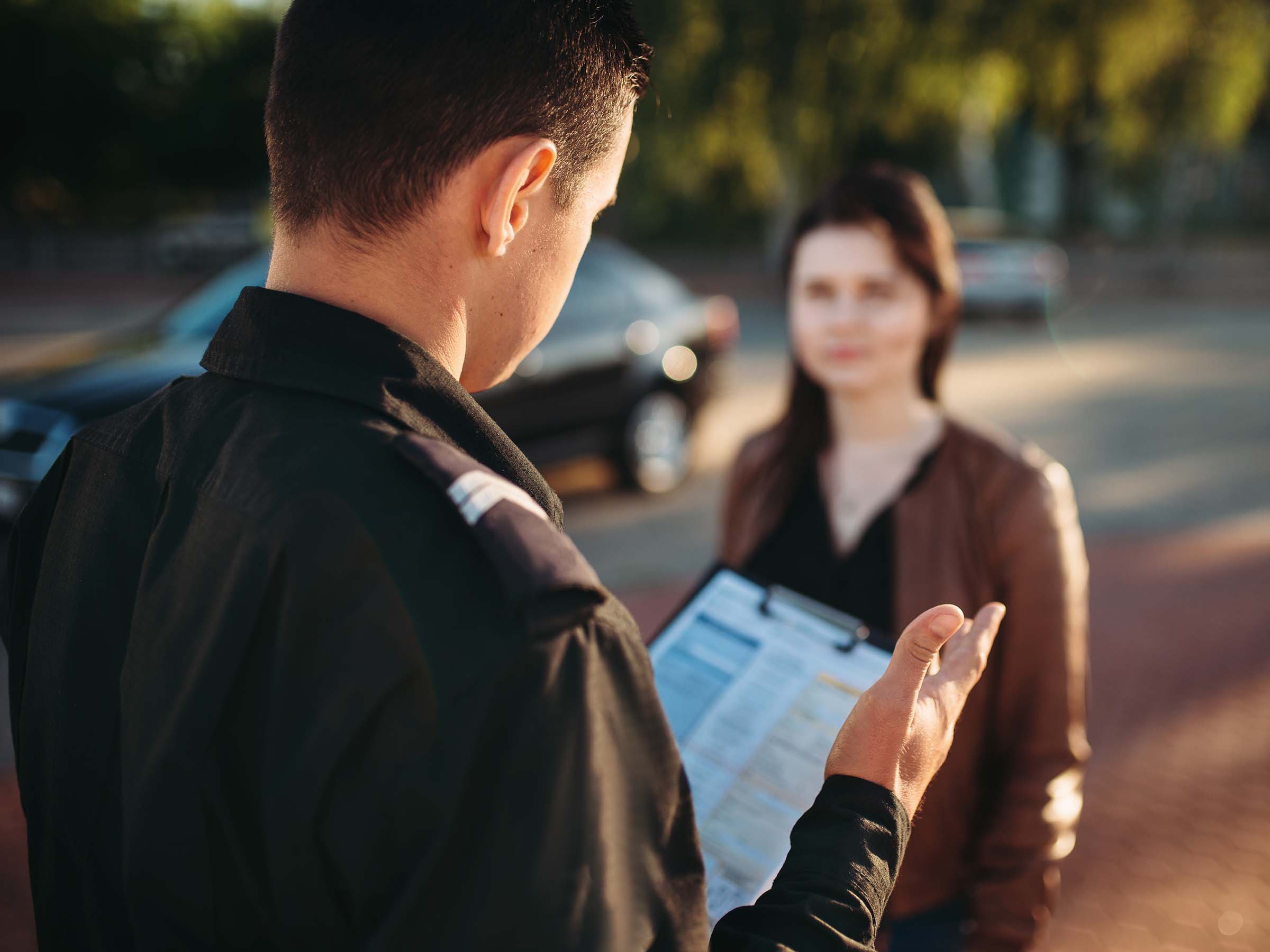 Kaufman & Stigger, PLLC | One Killed in DUI Accident in Louisville - police-officers-reads-law-to-female-driver-JZKG5ML.jpg