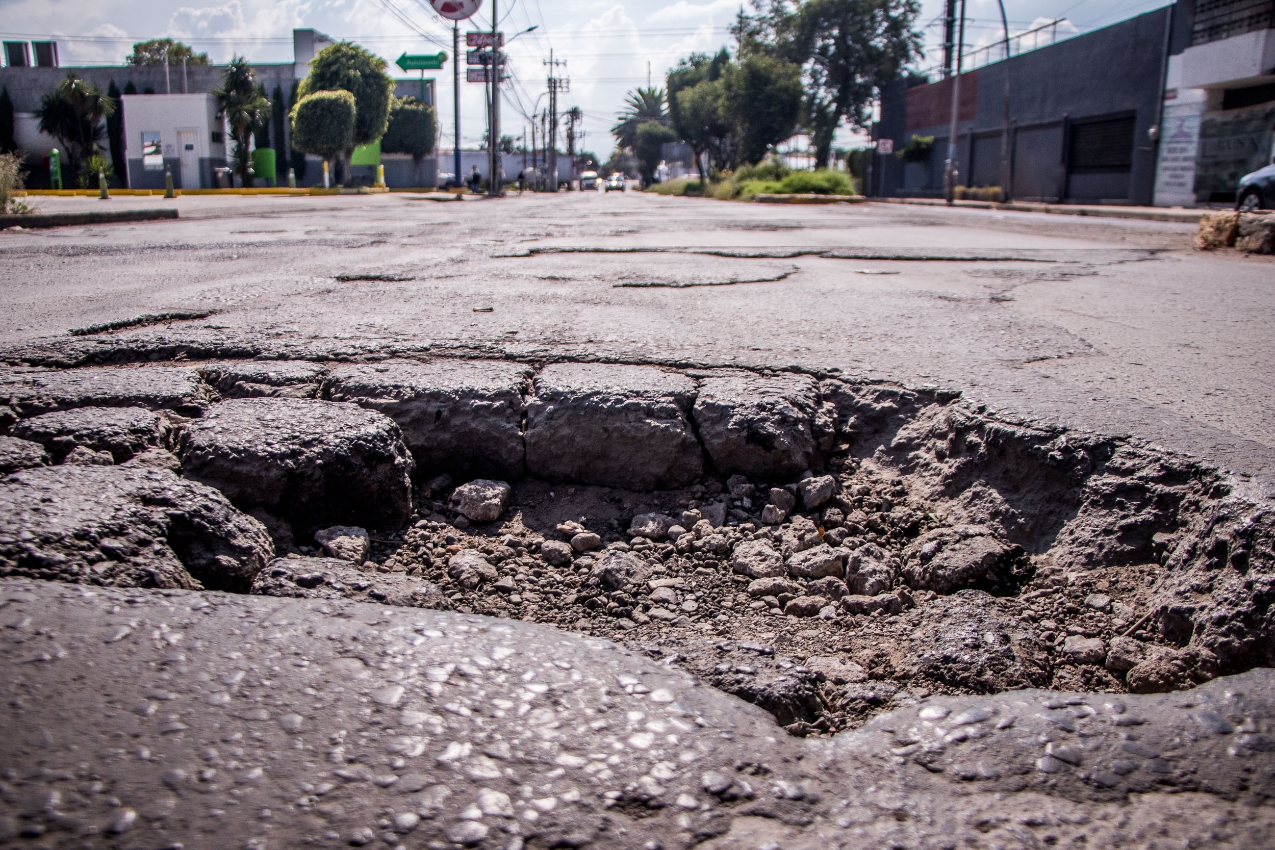 Kaufman & Stigger, PLLC | Motorcycle Accidents Caused by Potholes in Kentucky Kaufman & Stigger, PLLC | Motorcycle Accidents Caused by Potholes in Kentucky - Street,Pothole,On,Deteriorated,Asphalt,Pavement,In,Mexico