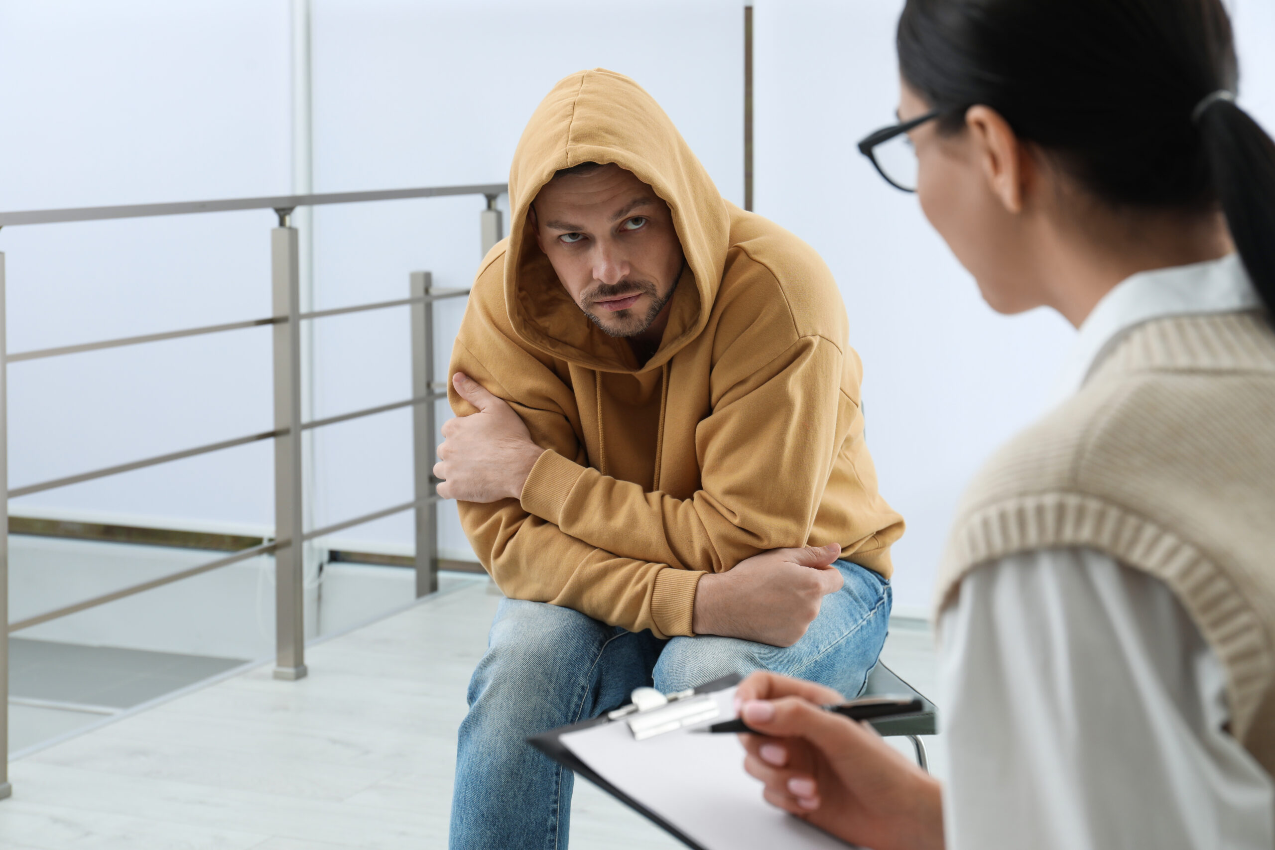 Kaufman & Stigger, PLLC | What is Drug Rehabilitation Facility Negligence Under Kentucky Law? - Psychotherapist,Working,With,Drug,Addicted,Man,Indoors