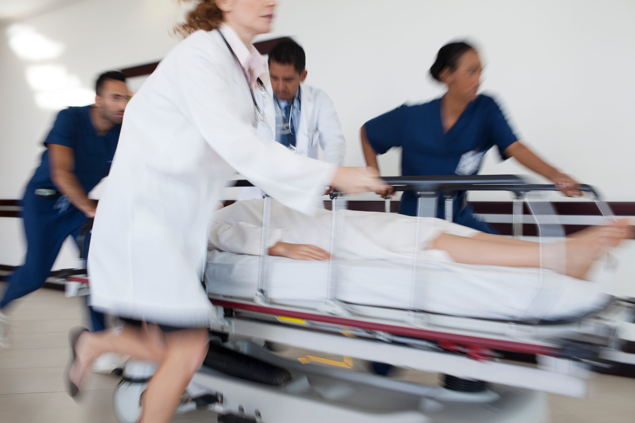 Kaufman & Stigger, PLLC | Can I Sue a Kentucky Drug Rehab Facility If They Ignore a Medical Emergency? - Hospital,Staff,Rushing,Patient,To,Operating,Room