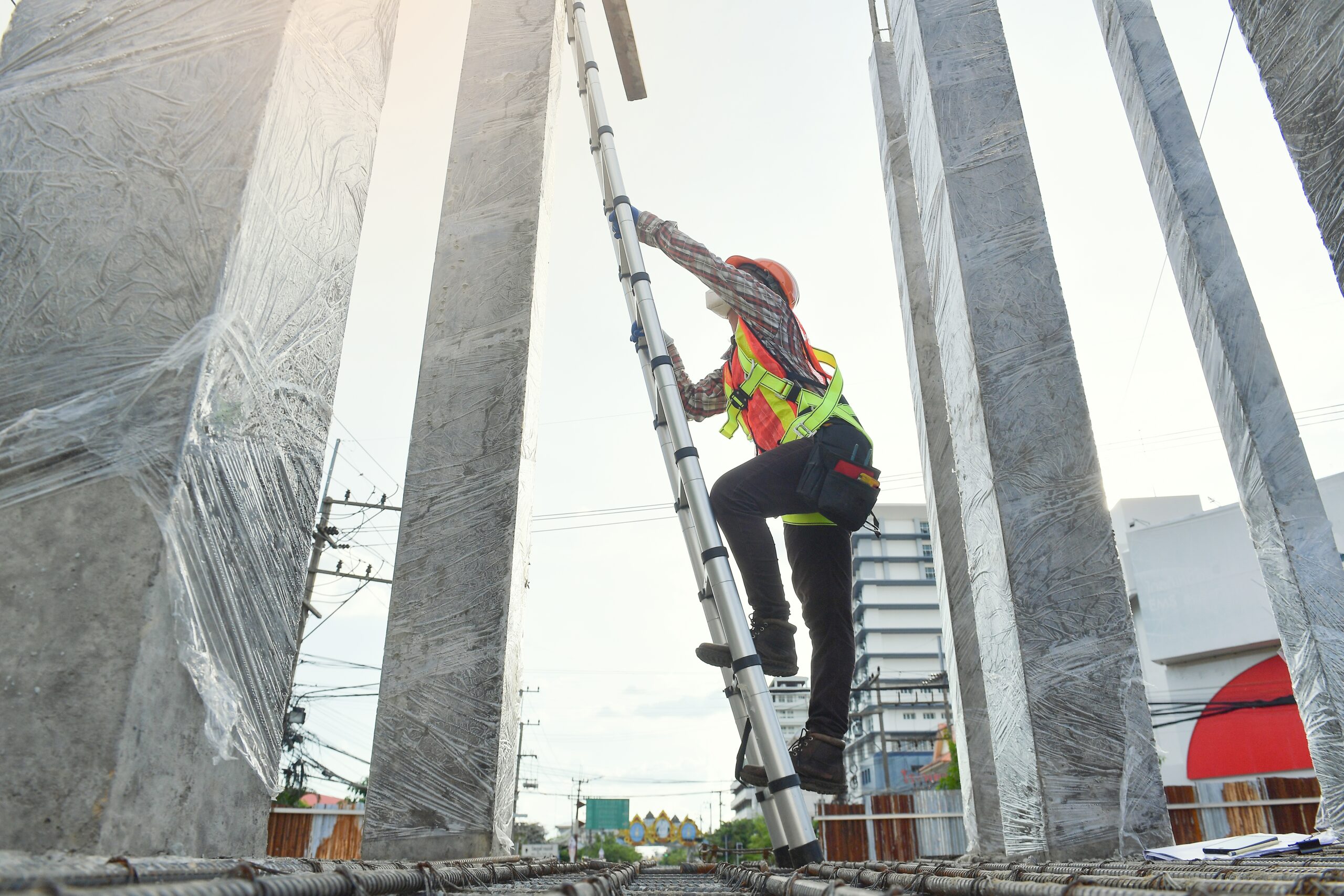 Kaufman & Stigger, PLLC | Louisville Scaffolding Accident Lawyer - Side,View,Of,Worker,Engineer,In,Safety,Helmet,Climbing,The